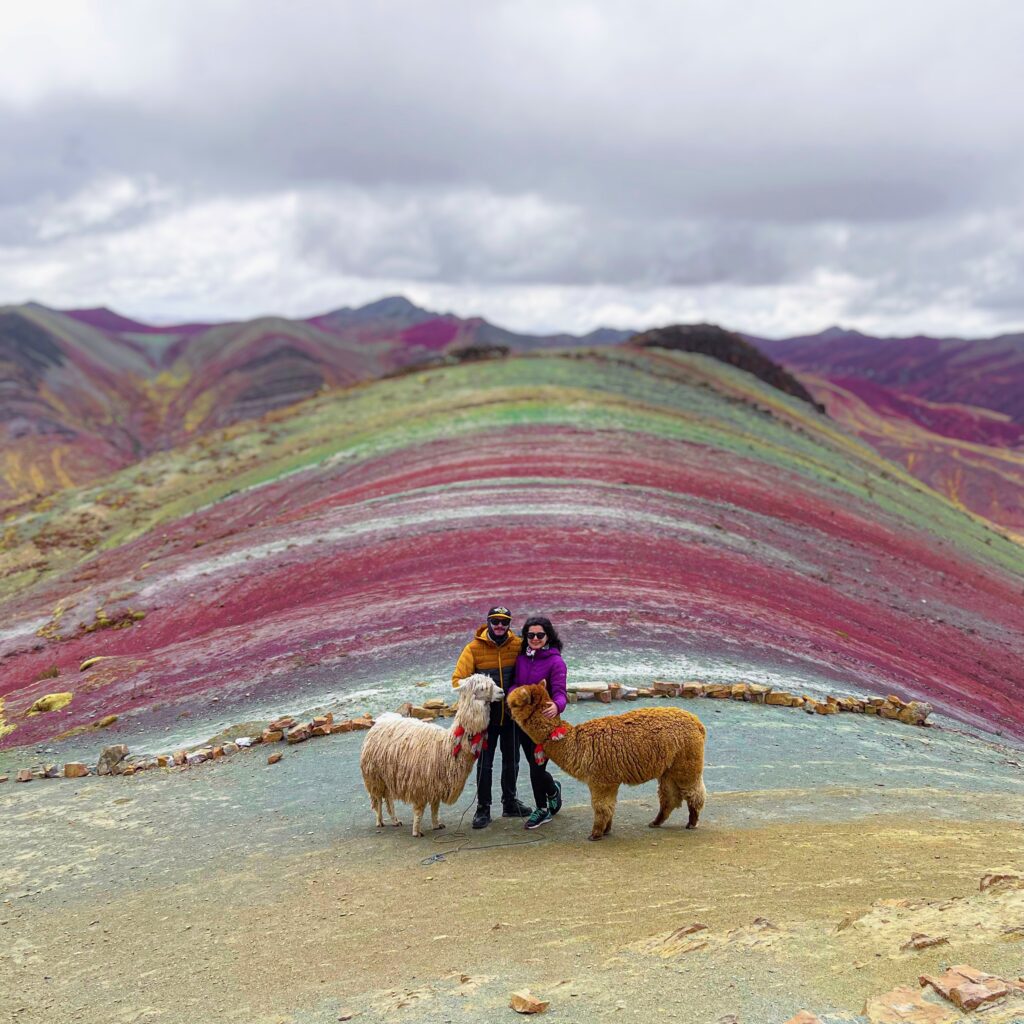 The travel unicorns slow-travel digital nomad couple rainbow mountain peru